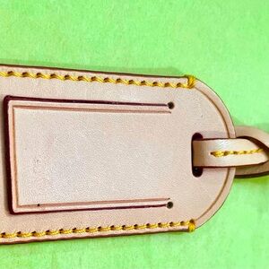 Dooney and Bourke Beige Leather Luggage Tag